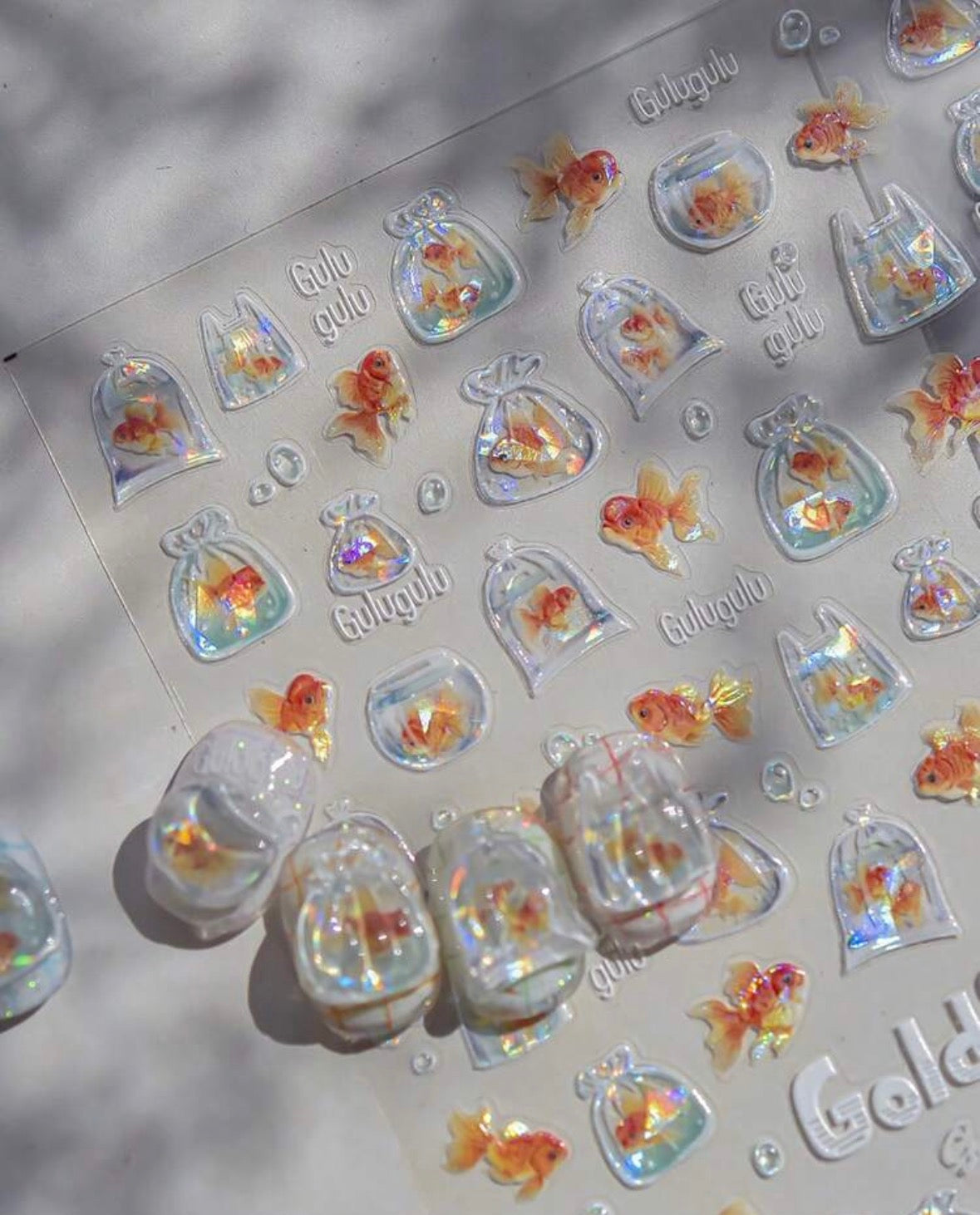 Stickers Uñas Pez en Bolsa
